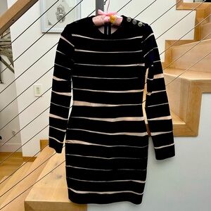 Stretch dress black with sheer beige inserts , length - above the knee ,